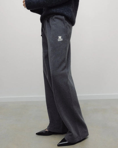 The New Society TNS Logo Woman Jogging