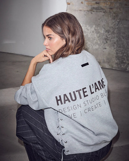 Haute L'amitié New Studio Tie Sweater